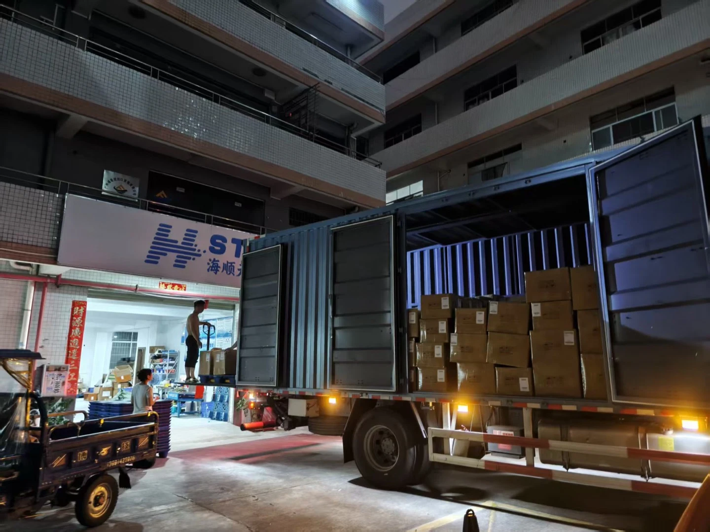 Packed goods being loaded for dispatch